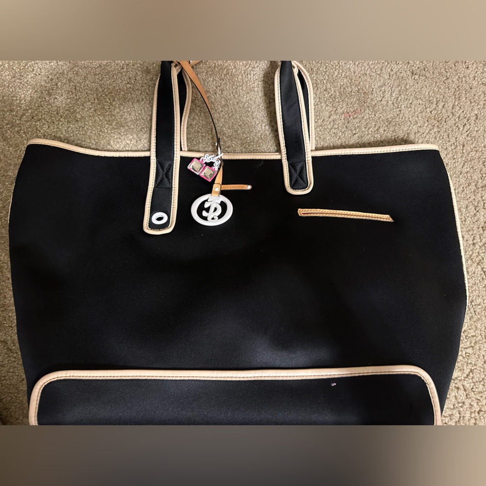 Juicy Couture oversized tote bag and two Juicy Couture wallets.
